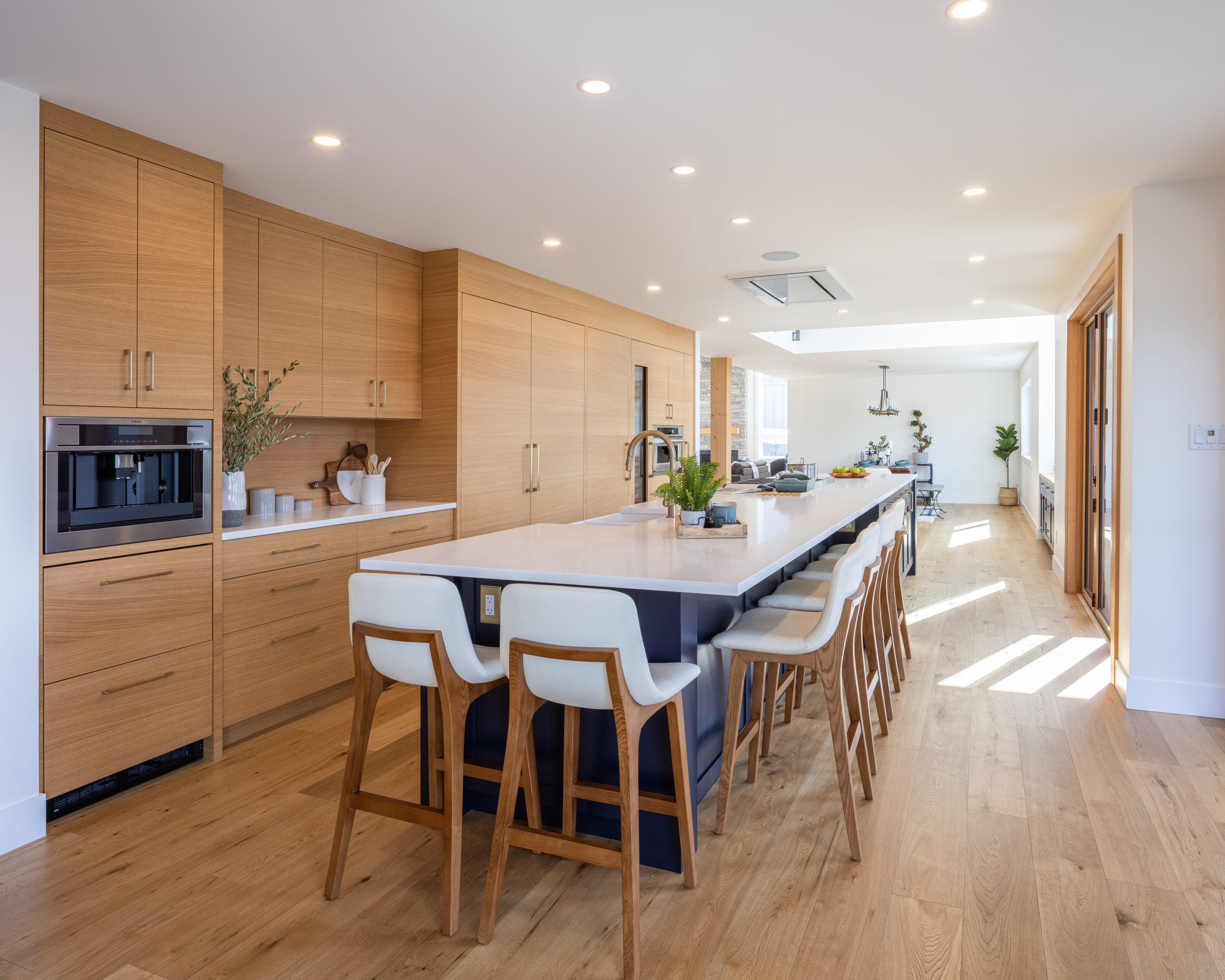 The long kitchen island and oak cabinetry at the Glacier View Drive major renovation.